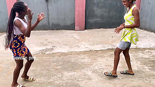African Girls Playing Local Game Outdoor