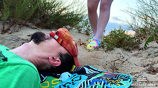 Mistress Pisses Straight Into Slave's Mouth on Wild Beach