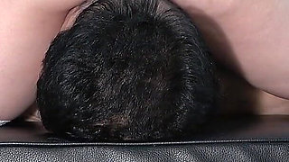 Female Office Worker Facesitting Her Senior Colleague as a Human Chair and Makes Her Manager to Work Hard