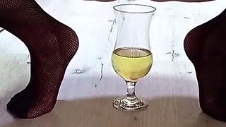 A glass of pee from a mature sexy woman