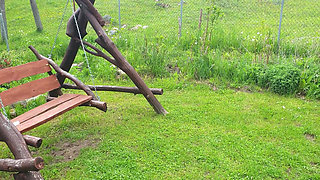 Raincoat, nylons and bra with open nipples