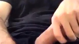 Muscular amateur strokes his big hard cock with a thick bell