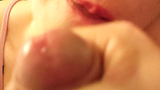 Close-up of her mouth filled with
