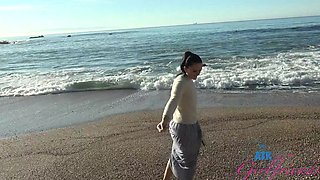 Beautiful brunette Imani Valor in hot glasses having sex on the beach.