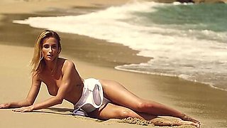 Beautiful small tits blonde MILF model Cara Mell hot posing on the beach
