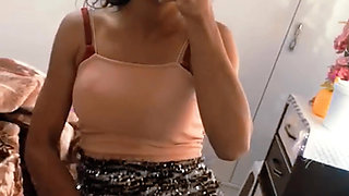 A Turkish woman in front of the mirror who asks when are you me?