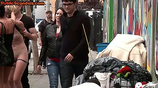 Public BDSM slut whipped and used for street shaming