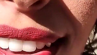 Smoking with Her Breasts Out