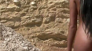 Perfect tanned babe undressing