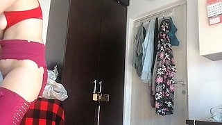 Sexy Latina Having Fun Trying on Clothes and Cutting Them