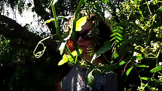 Sucking Black Cock in the Bushes
