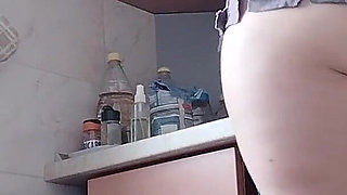 Sexy Naked Latina in the Kitchen with Hairy MILF Hair, Big Ass, Big Tits. Sexy Nude Woman Prepares Food in the Kitchen.
