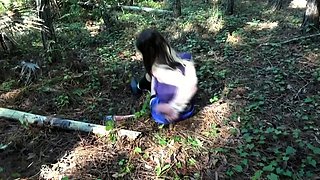 Girl in Leather Skirt tied up in the Forest