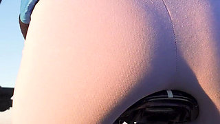 Teen Japanese Riding a Bicycle and Showing off Her Ass in Tight Leggings