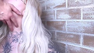 Making a big-tittied tattooed girl an oral slut by facefucking her hard