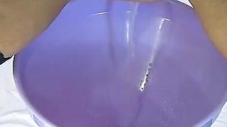 I Pee Into a Bottle Through a Funnel