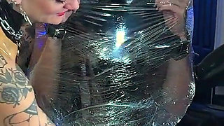 Princess Latex Rubber Doll Mummified and Edged While Standing