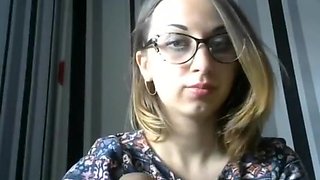 Beautiful girl with glasses easily fist her pussy