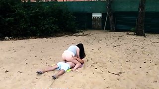 Beach voyeur filming brunette teen riding boyfriend's cock