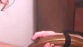 Mistress Strokes with Black Latex Gloves