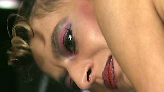 Attractive German doll gets tied up and rides a huge dildo