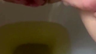 She pees in the toilet beautiful beautiful golden shower on toilet