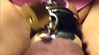 Reverse chastity belt with ring lock and blue penis plug in piss hole