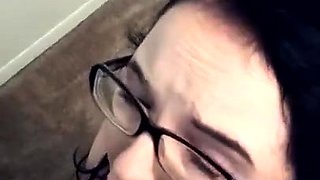 Kinky brunette with glasses worships a black cock POV style