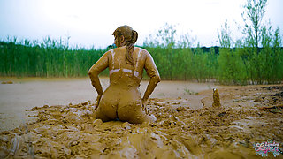 Orgasm in lake of mud - masturbating in clay