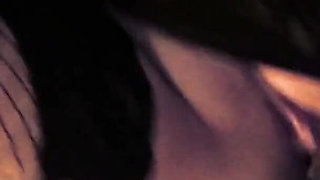 Horny brunette gives head to this dude with her friend at the same time