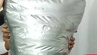 Latino Hunk Heavily Mummified by Cooperative Femdom Women