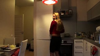 Sonya strip off in kitchen