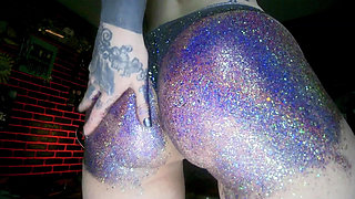 Alternative girl makes a mess with oil spanking by glitters