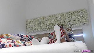 Sexy and Petite Girl with Overknee socks spreading legs to show pussy at home bored ignored