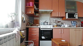 Sexy amateur wife prepares breakfast naked in the kitchen.