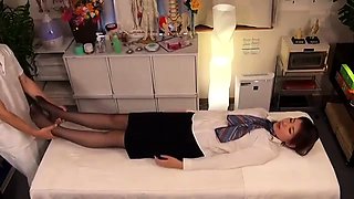 Elegant Oriental babe in pantyhose gets massaged and fucked