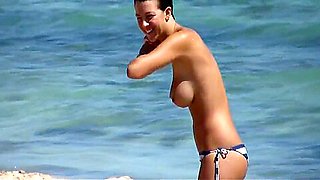 Nice brunette tits on the beach