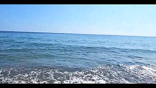 Between and Passers-by, We Try to Relax on the Beach