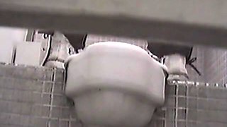 Piss pouring out of hot pussy on toilet voyeur scenes