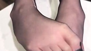 Hot brunette foot fetish play