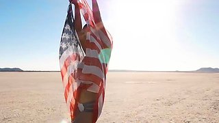 Curvy petite brunette strips at a beach