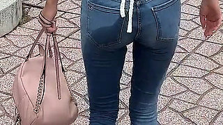 Public Wetting Jeans in Park Near the Beach
