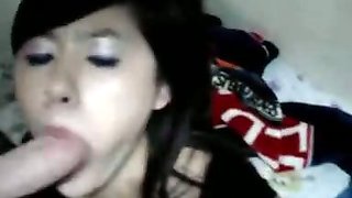 Innocent looking Asian teen blows a cock