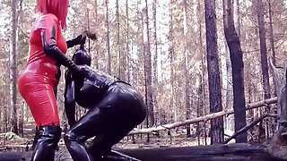 Femdom Humiliation Outdoor: Latex Mistress and Rubber Submissive