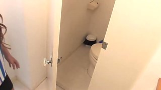Horny brunette masturbates solo in the toilet