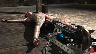 slender tattooed nympho gets railed by a dom stud's machine