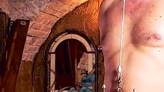 Whipping on restrained dick