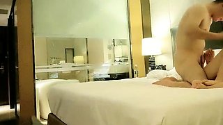 Cute amateur asian web cam girl playing with her toy