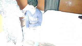 In the sunlight, the wife applied cream on it and blinked the husband's face.