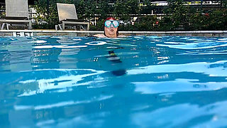 Couple Underwater Diving and Swimming